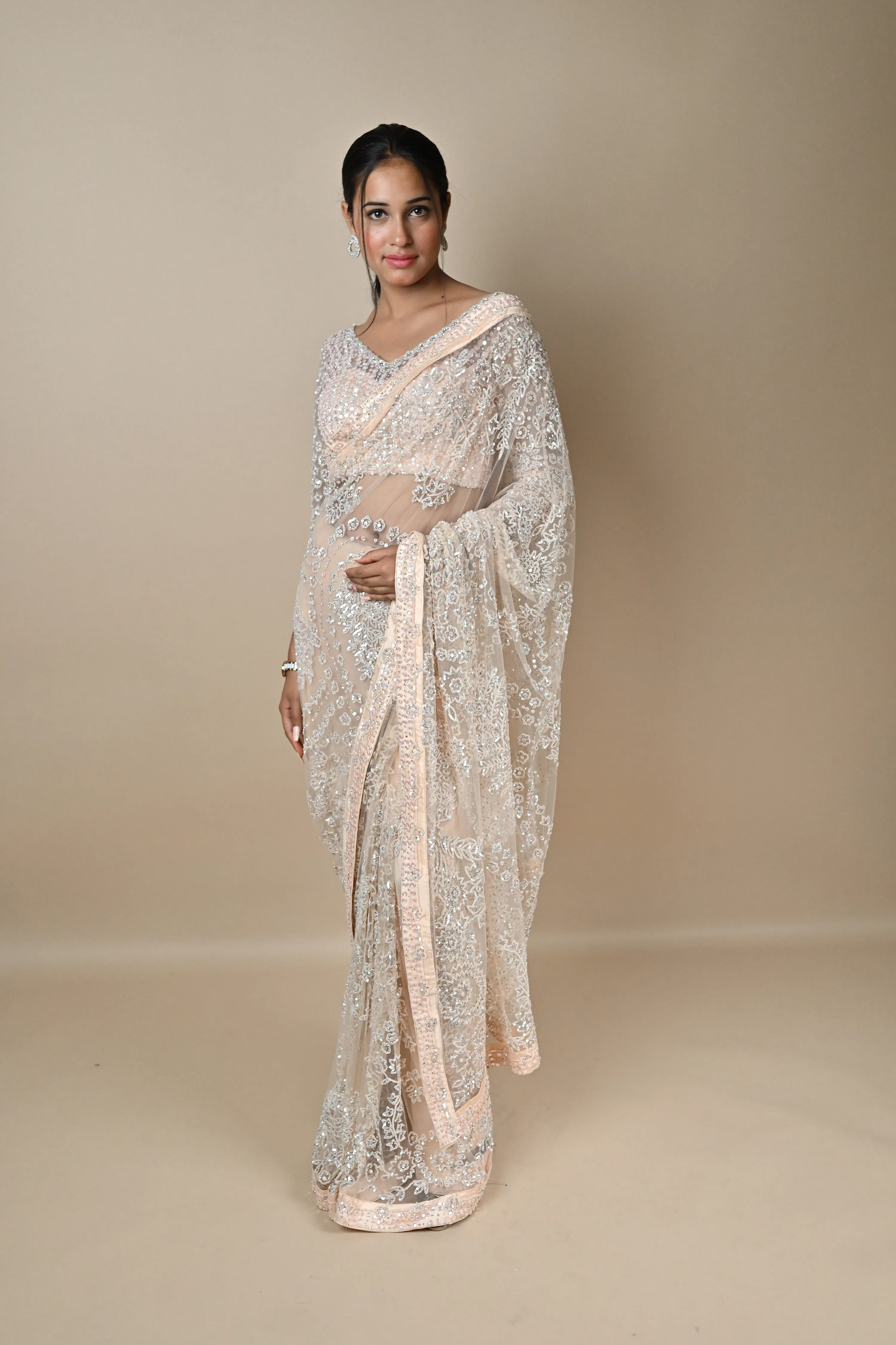 Hand embroidered Nude Pink designer saree