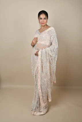 Hand embroidered Nude Pink designer saree